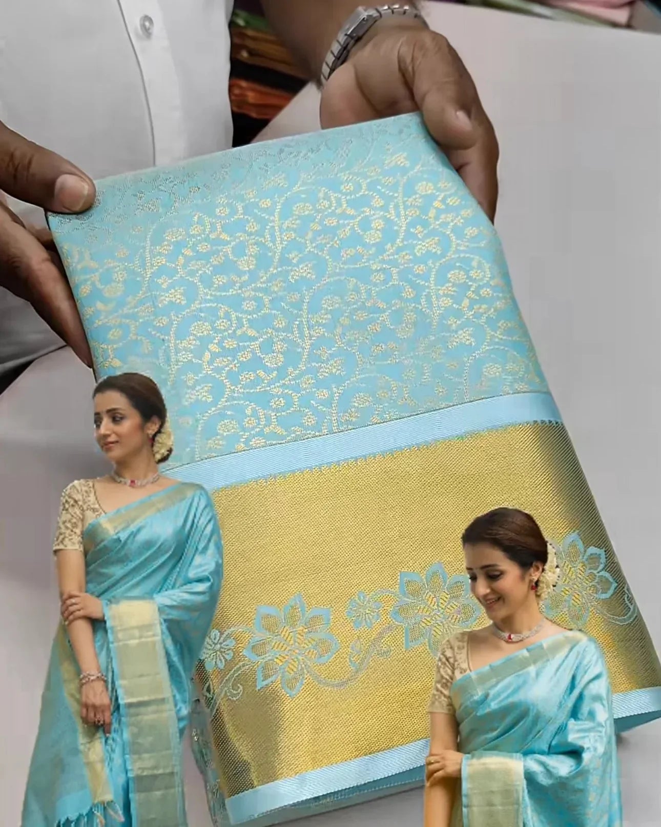 Promotional image of a saree with a woman wearing it, held by a person.