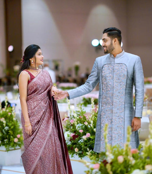 Elegant Maroon Silk Saree with All-Over Woven Motifs