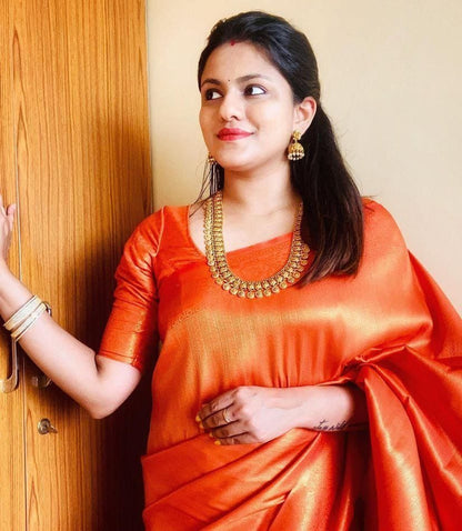 Vibrant Orange Soft Silk Saree with Elegant Minimal Finish